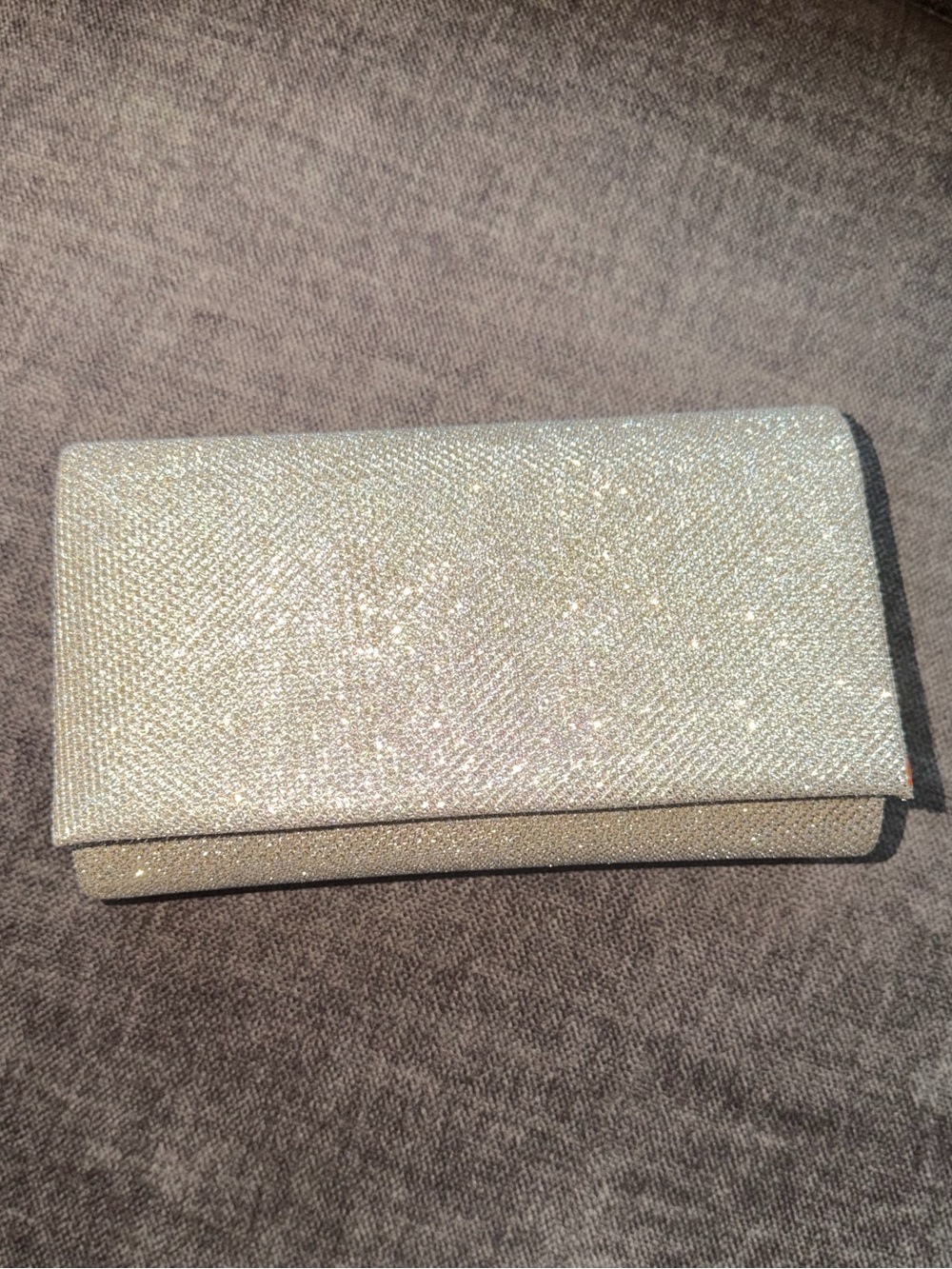 Browns Metallic Clutch in Gold in excellent condition